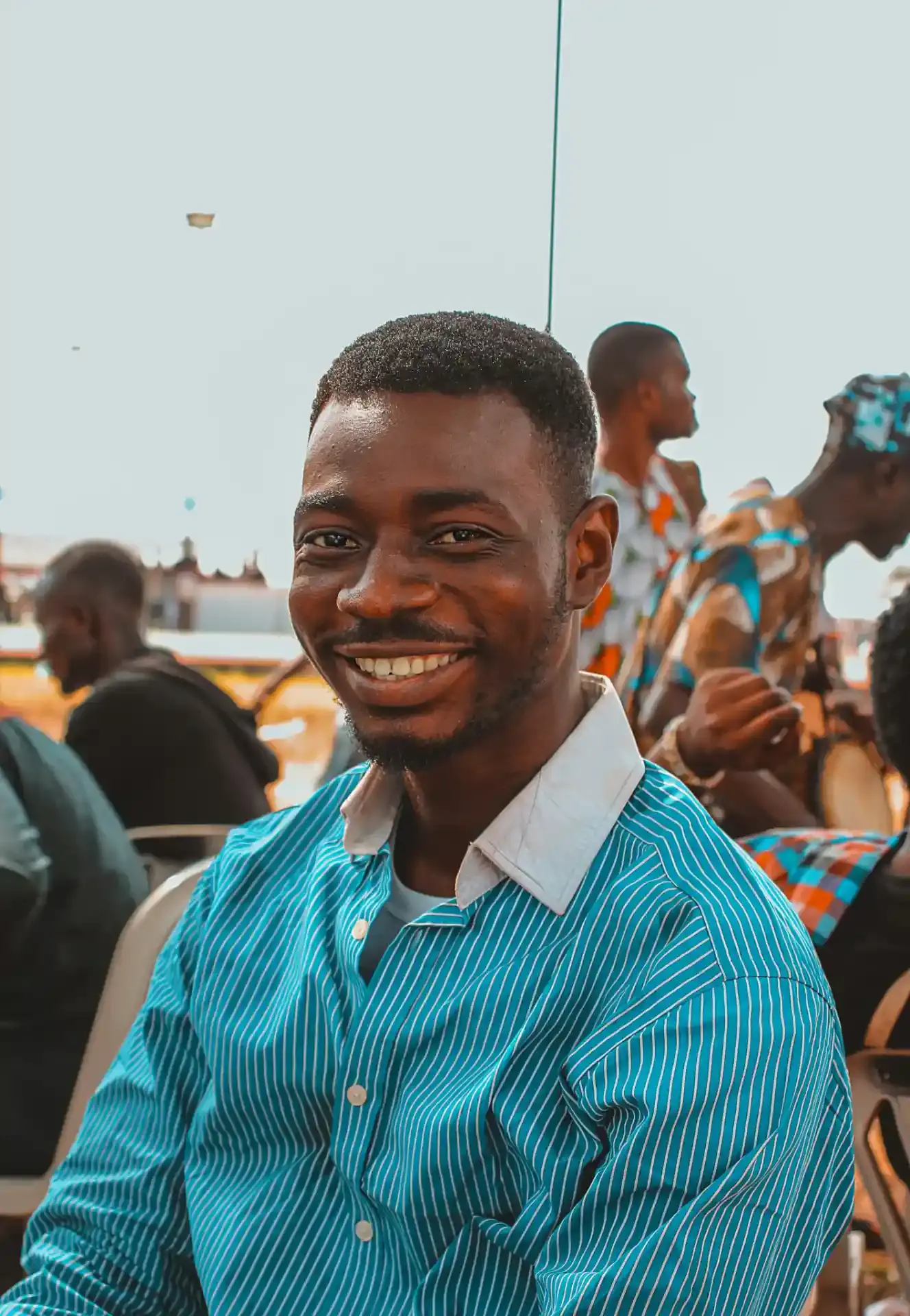 Smiling young man at an event